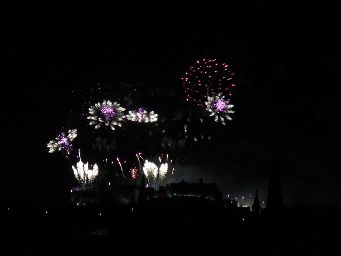 Fireworks over the Edinburgh skyline at New Year