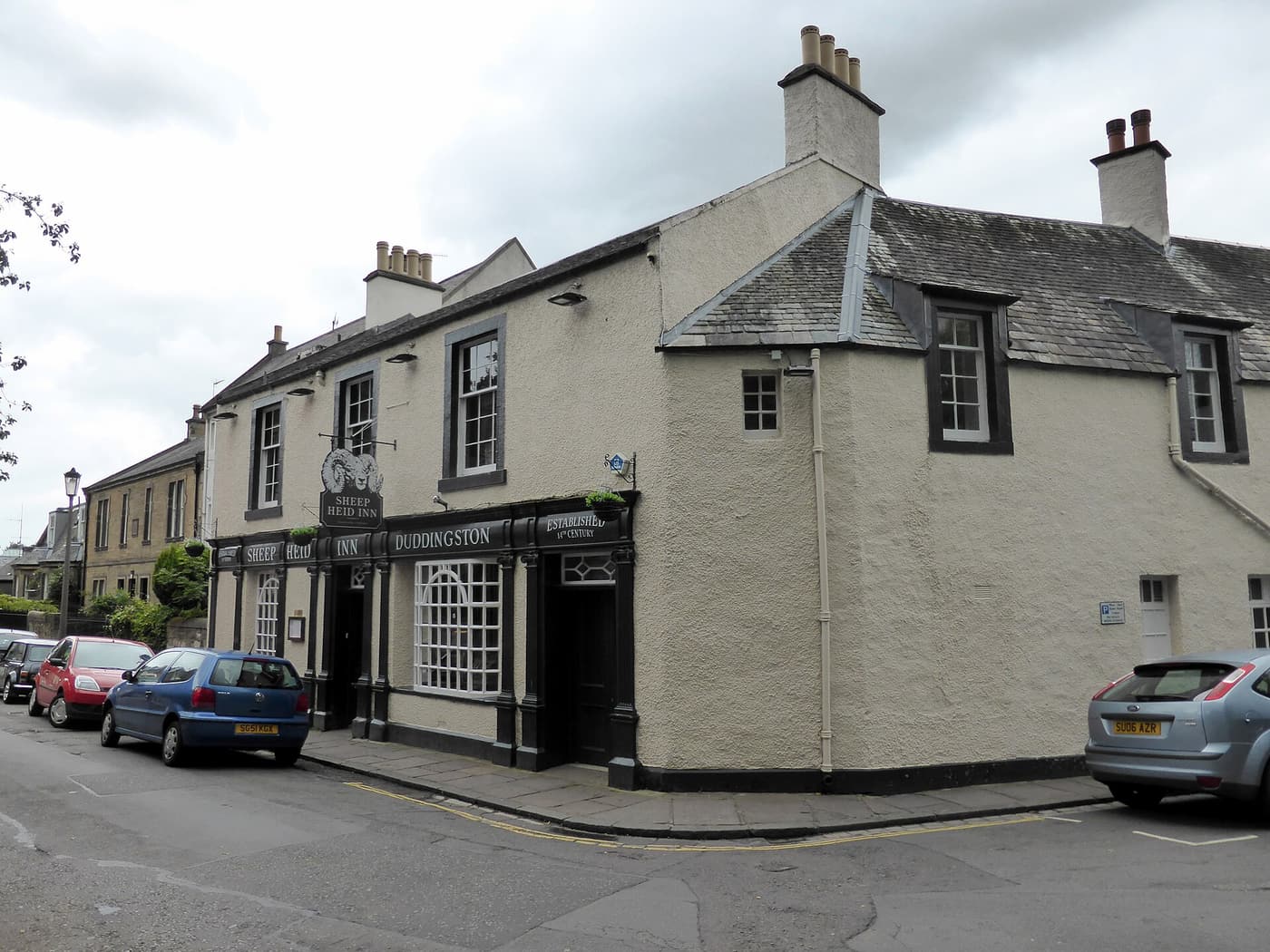 The white-painted Sheep Heid Inn on a street corner in Duddingston village